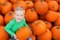 Kid at pumpkin patch Royalty Free Stock Photo