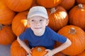 Kid at pumpkin patch Royalty Free Stock Photo