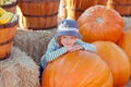 Kid at pumpkin patch Royalty Free Stock Photo