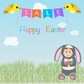 Kid in a rabbit suit sitting on the grass for happy easter sale Royalty Free Stock Photo