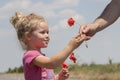Kid receiving flowers Royalty Free Stock Photo
