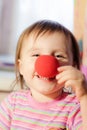 Kid with red nose Royalty Free Stock Photo