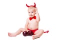 Kid in red suit of tempting devil Royalty Free Stock Photo