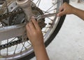 Kid repair chain of motorcycle