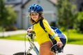 Kid riding bike in a helmet. Child riding bike in protective helmet. Safety kids sports and activity. Happy kid boy Royalty Free Stock Photo