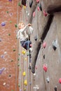 Kid rock climbing Royalty Free Stock Photo