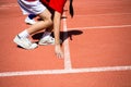 Kid runing on track in the Stadium