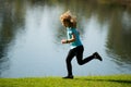 Kid runners run on lawn in park. Child running outdoor. Healthy sport activity for children. Little boy at athletics Royalty Free Stock Photo
