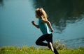 Kid runners run in park. Sporty young child jogging and training outdoor. Active energetic childhood. Royalty Free Stock Photo