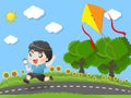 Kid running kites in the garden