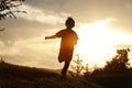 Kid running on meadow Royalty Free Stock Photo