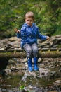 Kid's adventures in forest Royalty Free Stock Photo