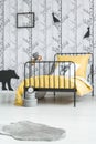 Kid`s bed with yellow overlay Royalty Free Stock Photo