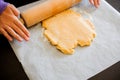 Kid's Hands Rolling Shortcrust Dough closeup