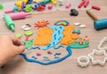 Kid`s playing and creating toys from play dough