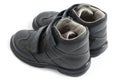 Kid's shoes from the black leather Royalty Free Stock Photo