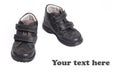 Kid's shoes from the black leather Royalty Free Stock Photo