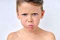 Kid with sad face, Upset little boy, Unhappy child looking out, Spoiled kid alone Royalty Free Stock Photo