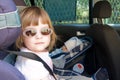 Kid in a safety car seat Royalty Free Stock Photo