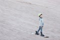 Kid sandboarding in atacama desert Royalty Free Stock Photo