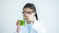 Kid scientists studying science, experimenting with chemicals or microscope, Young scientist making experiments in home laboratory Royalty Free Stock Photo