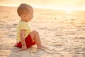 Kid sitting on beach Royalty Free Stock Photo