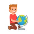 Kid sitting at terrestrial globe Royalty Free Stock Photo