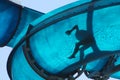 Kid sliding a blue Waterslide