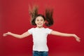 Kid smiling cute face live carefree happy life. Enjoy every moment. Young and free. Happy child girl with long hair on Royalty Free Stock Photo