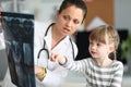 Kid speaking with doctor