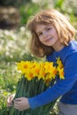 Kid in spring cherry blossom park. Happy childhood. Spring holidays. Adorable boy in spring garden. Cute little kid boy Royalty Free Stock Photo