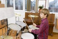 Kid Studying Drums Royalty Free Stock Photo