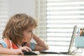 Kid studying at school. Schoolchild doing homework at classroom. Education for kids. Royalty Free Stock Photo