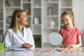 Kid with stuttering problem visiting speech-language therapist at clinic Royalty Free Stock Photo