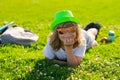 Kid summer. Happy child enjoying on grass field and dreaming. Summer holiday. Royalty Free Stock Photo