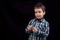 Kid with sunglasses on head keeping track of time Royalty Free Stock Photo