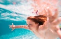 Kid swimming underwater in pool. Blue sea water. Child boy swimming in sea. Kids beach fun. Royalty Free Stock Photo