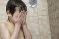 Kid takes a shower Royalty Free Stock Photo