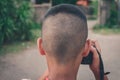 Kid taking picture using DSLR camera Royalty Free Stock Photo