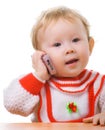 Kid talking on a cellular phone Royalty Free Stock Photo