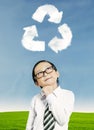 Kid thinking about recycling Royalty Free Stock Photo