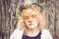 Kid with tiger face painting Royalty Free Stock Photo
