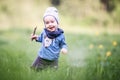 Kid toddler in grass, happy expression Royalty Free Stock Photo