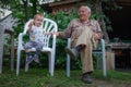 Kid toddler and his grandfather Royalty Free Stock Photo