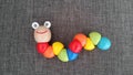 Kid toy colorful snake isolated on grey background