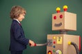 Kid with toy robot in school Royalty Free Stock Photo