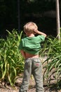 Kid urinating Royalty Free Stock Photo