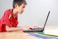 Kid using laptop Royalty Free Stock Photo