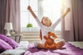 Kid wakes up from sleep. Royalty Free Stock Photo