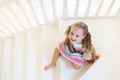 Kids on stairs. Child moving into new home Royalty Free Stock Photo